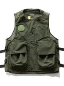 Green tactical vest with multiple pockets on a white background, Obroi