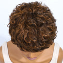 Mannequin head with a brown curly wig on a white background, Obroi