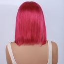 Mannequin head with bright pink hair on a light gray background, Obroi