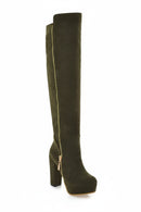 Black riding boot on a light gray background, Obroi