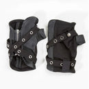A pair of black padded protective guards or pads with adjustable straps, metal grommets, and a zipper closure, displayed on a clean white background, Obroi