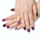 Close-up of hands with purple and black nail polish on a white background, Obroi