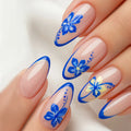 Nails with blue floral designs on a light background, Obroi