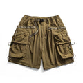 Brown cargo shorts with multiple pockets on a white background, Obroi