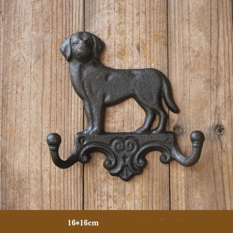 Decorative wall hook shaped like a dog on a wooden background, Obroi