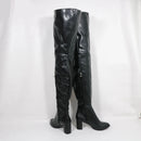 Black leather knee-high boots on a white background with 'Obroi' branding.