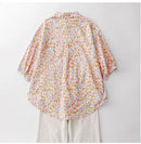 Floral patterned shirt on a plain background, Obroi