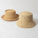Two woven hats on a light gray background, Obroi