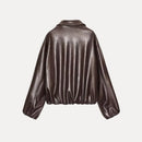 Metallic brown jacket on a light gray background, Obroi