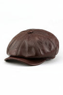 Brown leather cap on a white background, Obroi