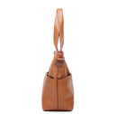 Brown leather handbag with a shoulder strap on a white background, Obroi