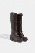 Pair of brown leather knee-high boots with buckles on a white background, Obroi