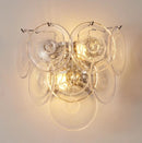 Modern wall light fixture with glass panels on a neutral background, Obroi