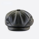 Black leather cap on a white background, Obroi