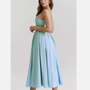 Light blue strapless dress on a plain background, Obroi