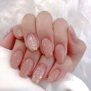 Hand with pink nail polish and glitter accents on a white background, Obroi