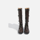 Pair of brown leather boots with buckles on a white background, Obroi
