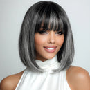 Woman with a stylish haircut against a plain background, Obroi