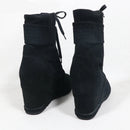 Black wedge boots with a white background, Obroi
