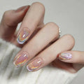 Hand with iridescent nail polish on a neutral background, Obroi