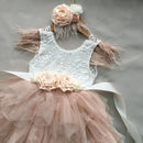 Children's dress with lace top and pink tulle skirt on a gray background, Obroi