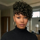 Woman with styled hair wearing a black turtleneck in an indoor setting, Obroi