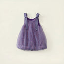 A toddler girl's sleeveless tutu dress in sparkling lavender purple tulle with matching ribbon shoulder straps, shown flat against a light cream background with decorative text overlays, Obroi