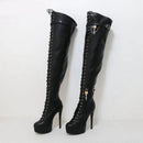 Black knee-high boots with high heels and decorative laces on a white background, branded 'Obroi'.