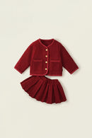 Red textured jacket and skirt set on a beige background, Obroi