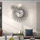 Decorative wall clock with floral design in a living room setting, Obroi