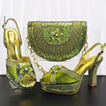 Green high-heeled shoes and matching handbag with floral decorations on a white background, Obroi
