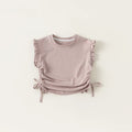 Pink sleeveless top with ruffled details on a white background, Obroi