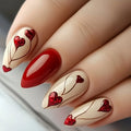 Nails with red and beige design featuring hearts on a neutral background, Obroi