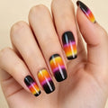 Nails with a black, orange, and purple gradient design on a beige background, Obroi