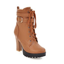 Brown leather boot with a block heel on a white background, Obroi