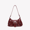 Red handbag with a strap on a white background, Obroi