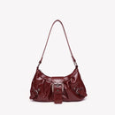 Red handbag with a strap on a white background, Obroi