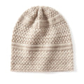 Knitted beanie with cable pattern on a white background, Obroi