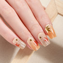Nails with a gradient design and leaf decorations on a neutral background, Obroi