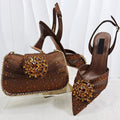 Brown high-heeled shoes and matching handbag with decorative elements on a white background, Obroi