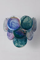 Colorful circular light fixture with 'Obroi' branding on a gray background