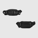 Two black leather waist bags on a light gray background, Obroi