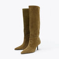 Pair of brown suede knee-high boots on a white background, Obroi