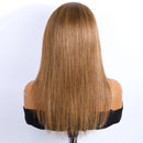 Brown wig on a mannequin head against a white background, Obroi