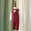 Red checkered suit with vest and bow tie on a mannequin against a curtain background, Obroi