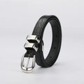 Black leather belt with silver buckle on a light gray background, Obroi