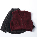 Maroon knitted vest on a black and white striped shirt , Obroi