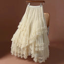 White ruffled skirt on a chair against a brown background, Obroi