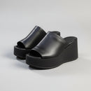 Black platform sandals on a light gray background, Obroi