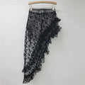 Black floral lace skirt on a hanger against a white background, Obroi